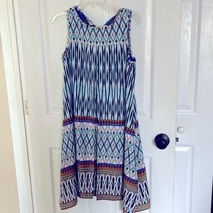 Summer slip over dress with no sleeves and no zipper.
